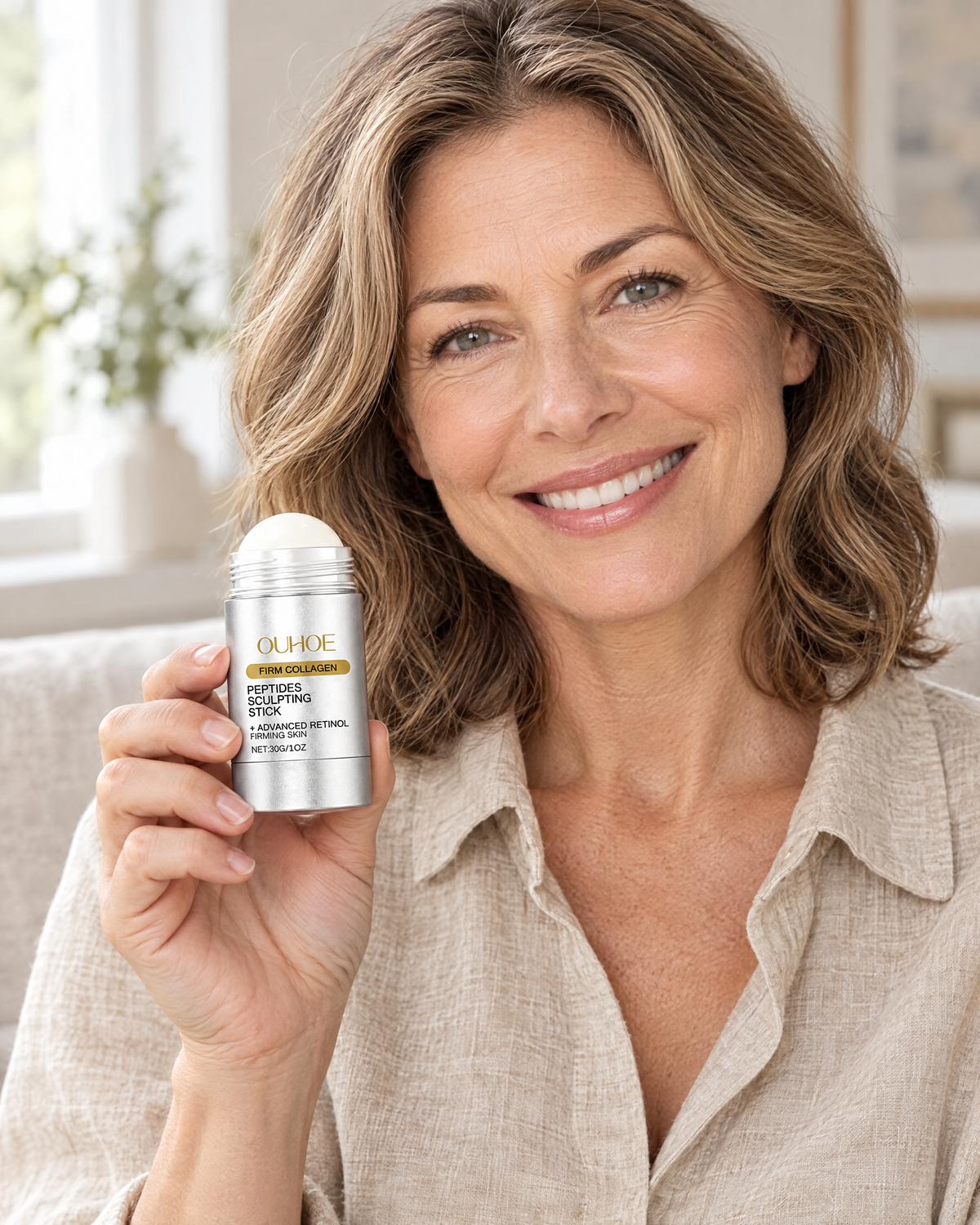 Smiling woman holding the Care Stick